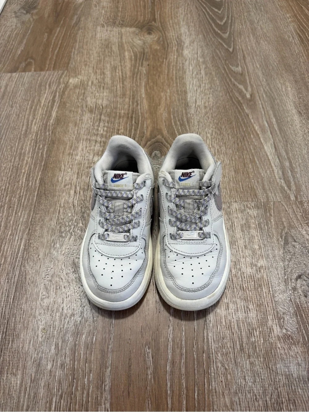 Nike Kids White and Light Gray Low-Top Sneakers with Purple Logo
